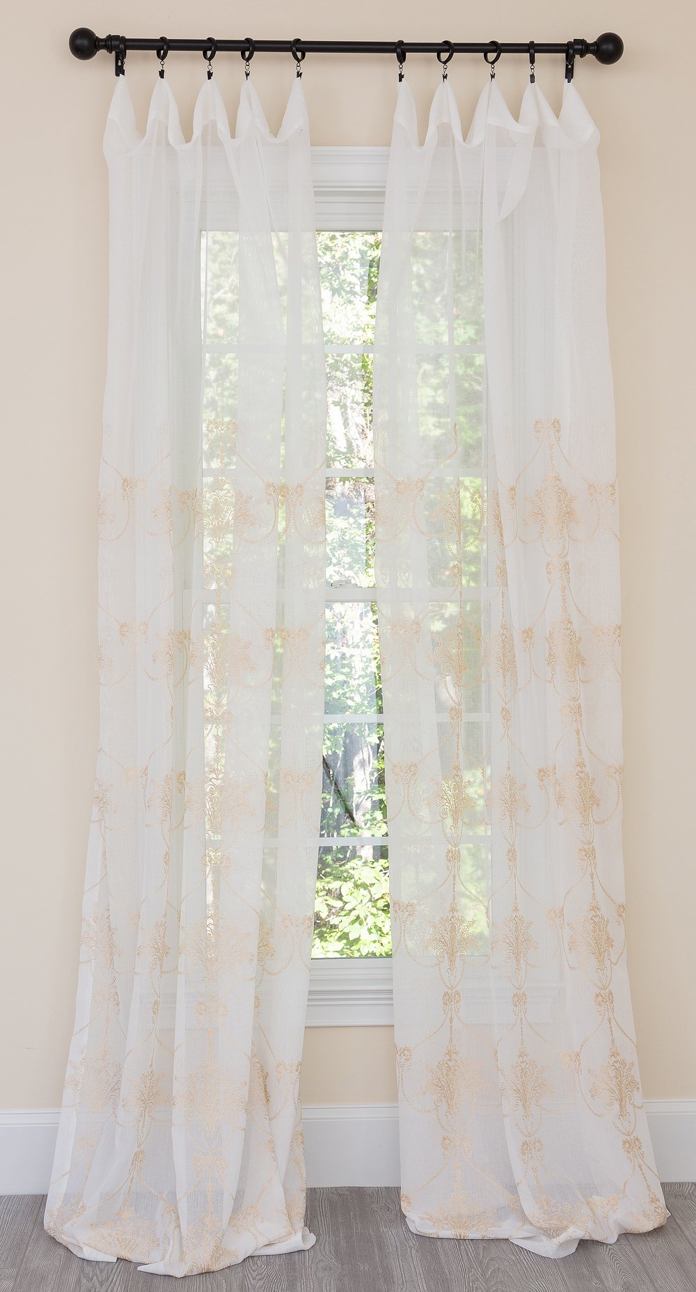 ML19007 Lillie Sheer Curtain featuring an intricate heart-shaped embroidered pattern in lightweight sheer fabric, available in White and Gold.